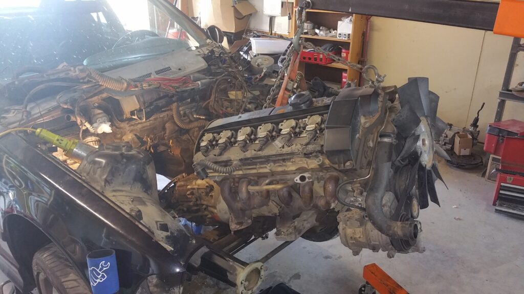 Old Motor Being Removed from the e36